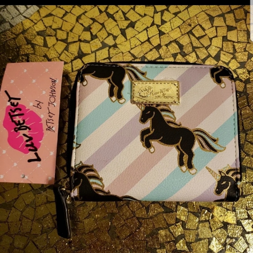 Luv Betsey black Unicorn with pastel stripes